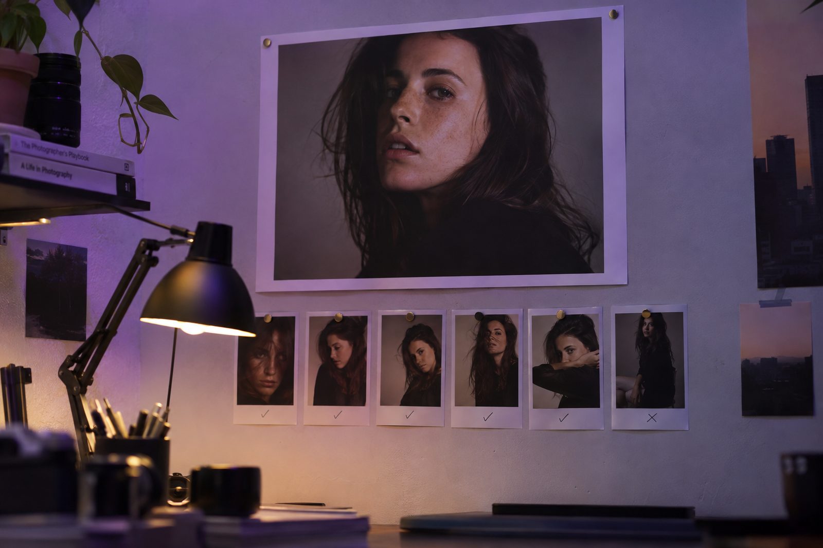 A reference portrait pinned above a row of photo thumbnails being checked